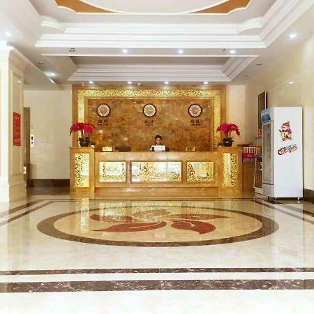 Longhui Business Hotel Хуижоу Екстериор снимка