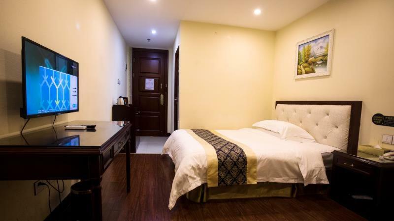 Longhui Business Hotel Хуижоу Екстериор снимка