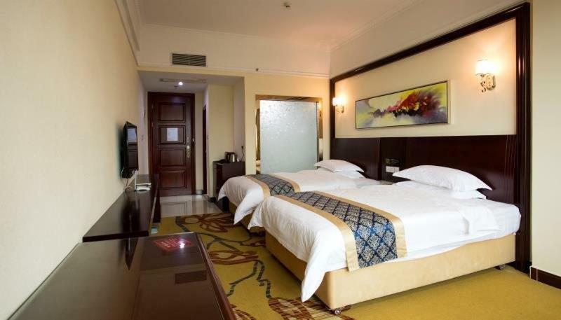 Longhui Business Hotel Хуижоу Екстериор снимка