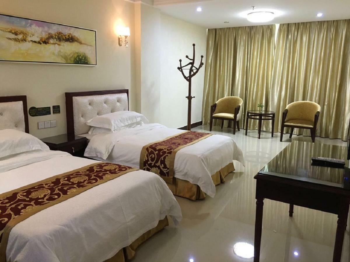 Longhui Business Hotel Хуижоу Екстериор снимка